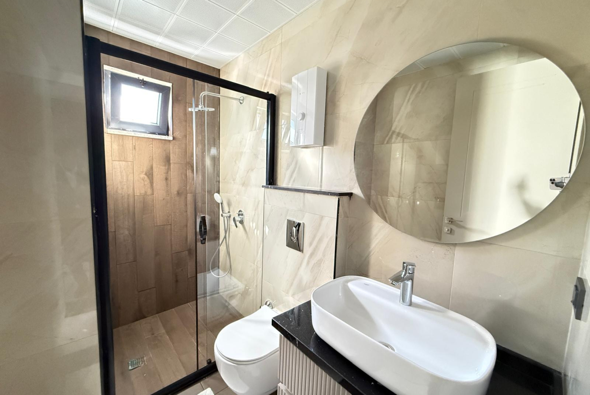 продажа квартиры в новом комплексе в районе Джикджилли, Алания