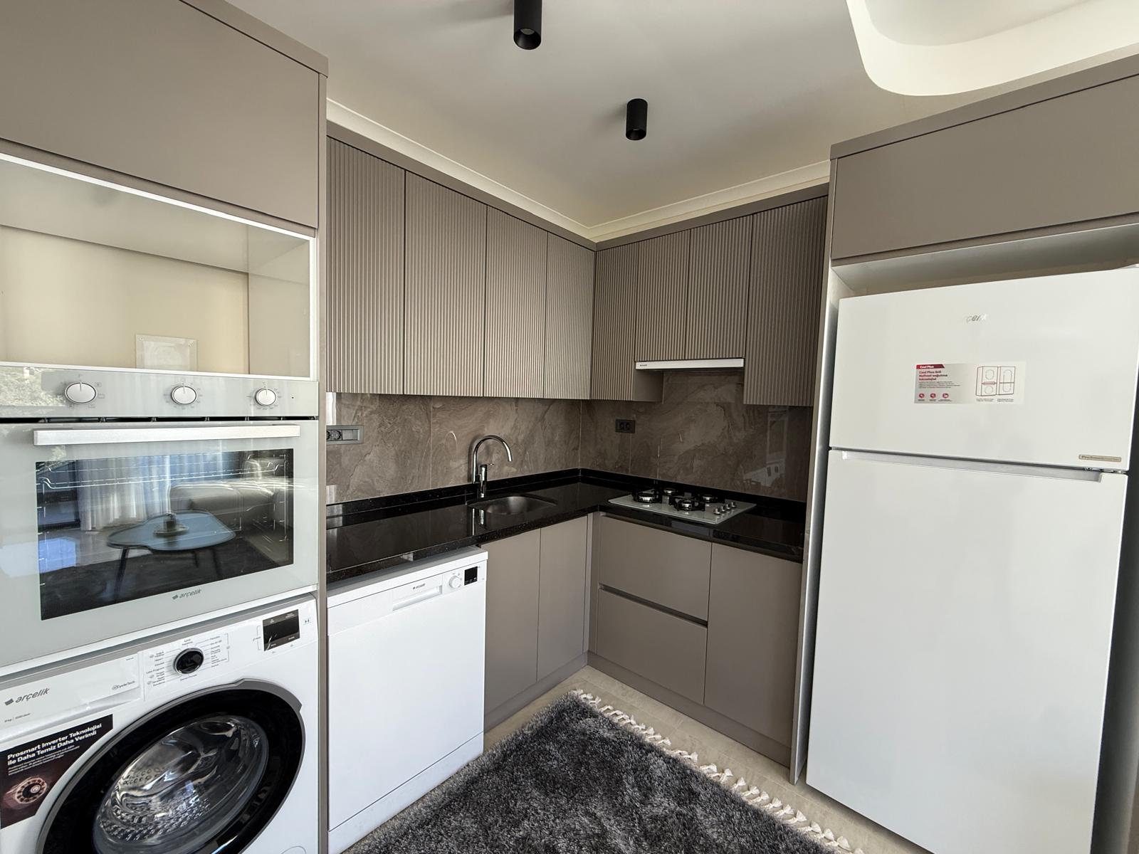 WhatsApp Image 2026-01-22 at 08.34.24 продажа квартиры в новом комплексе в районе Джикджилли, Алания