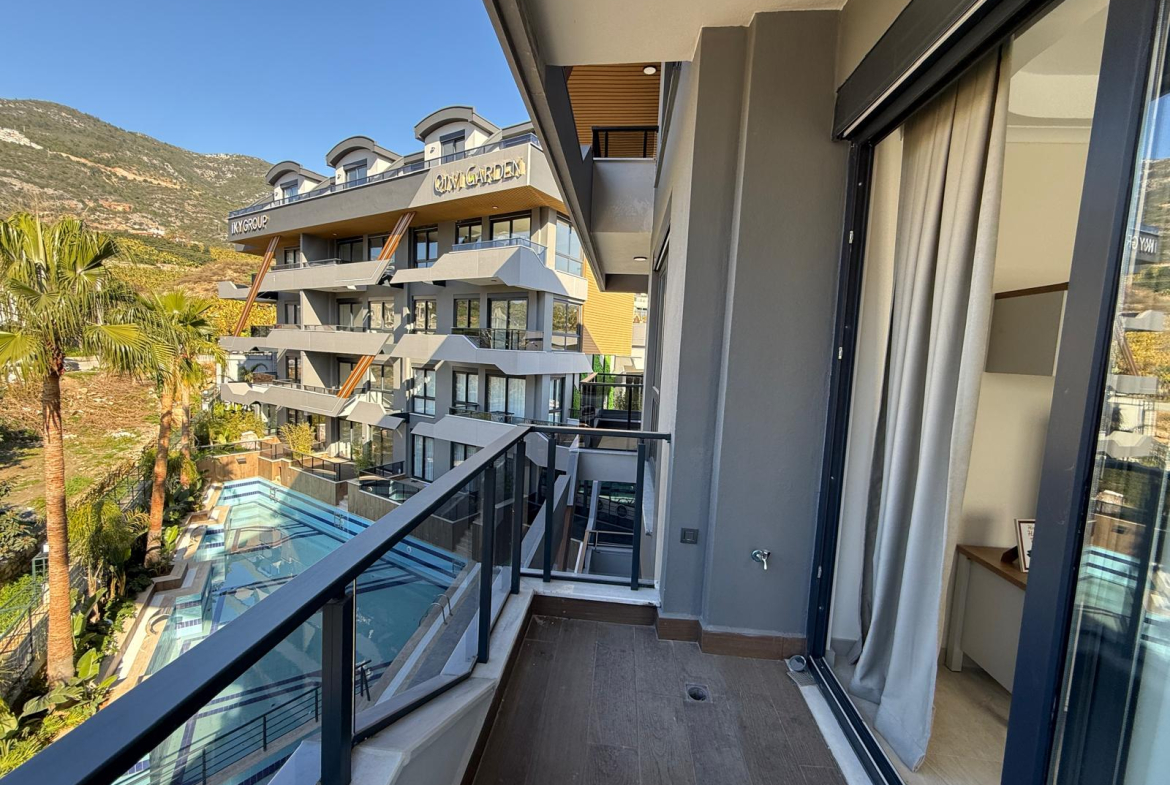 продажа квартиры в новом комплексе в районе Джикджилли, Алания