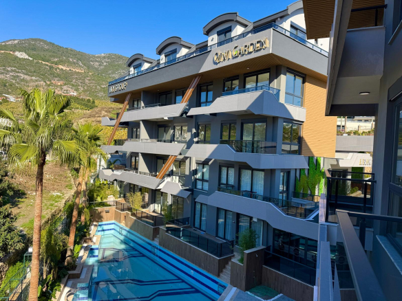 продажа квартиры в новом комплексе в районе Джикджилли, Алания