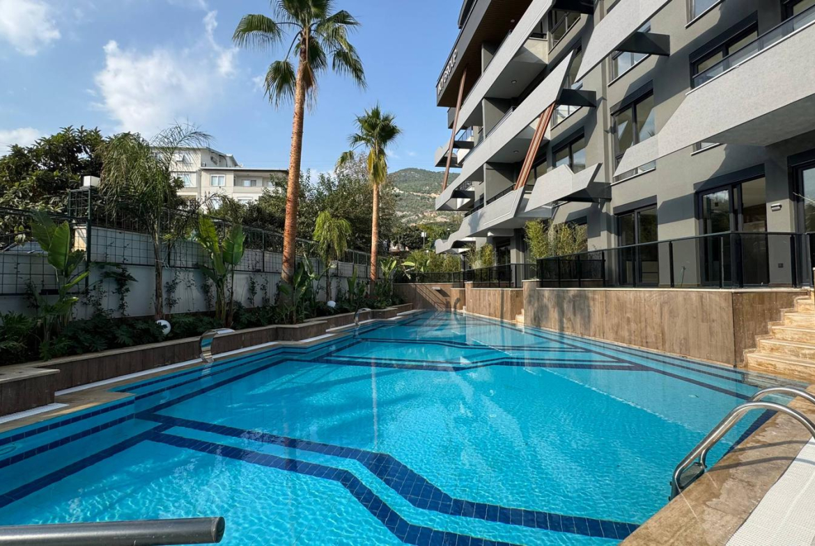 продажа квартиры в новом комплексе в районе Джикджилли, Алания